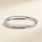 T Lock Bangle In White Gold With Diamonds Bracelet